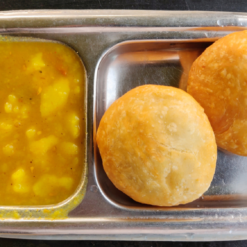 Kachori with Aloo Sabji (Spiced Lentil-Filled Pastry with Potato Curry)