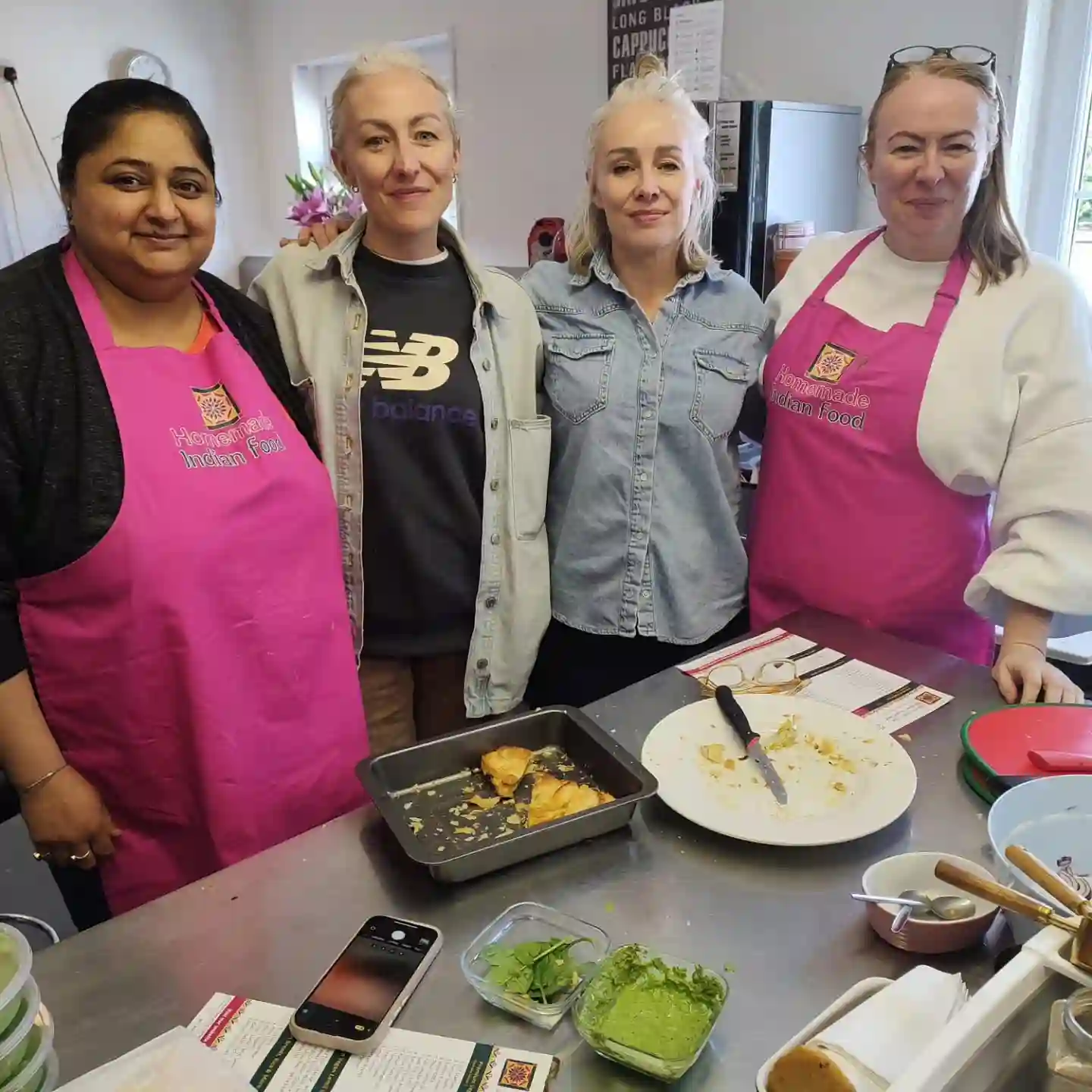 Guests with the dishes they cooked