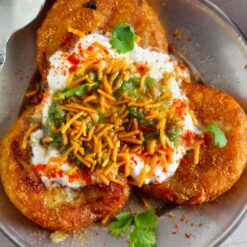 Aloo Tikki Chaat (Spiced Potato Patties with Tangy Toppings)