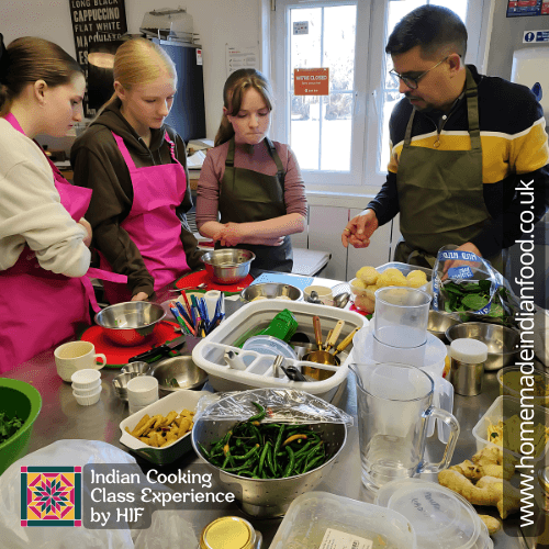 Guests cooking at the kitchen counter